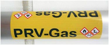 Image of a pipe labeled with GHS pictograms and label